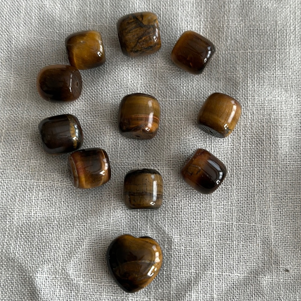 Tigereye barrel beads ten of them and one large heart bead tiger eye 1” wide
